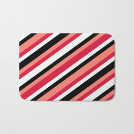 [ Thumbnail: Salmon, Crimson, Mint Cream & Black Colored Lined Pattern Bath Mat ]