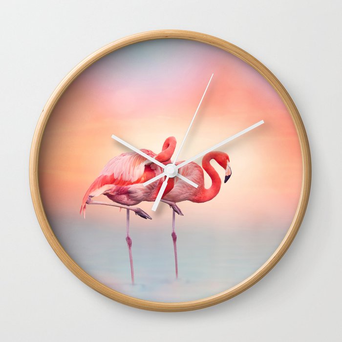 Two Pink flamingos in the water at sunset Wall Clock
