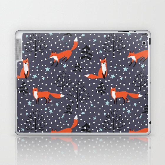 Red foxes in the nignt winter forest Laptop & iPad Skin