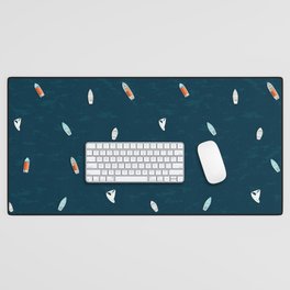 Small boats on blue Desk Mat