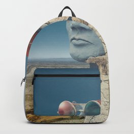 sculpture face strange desert Backpack