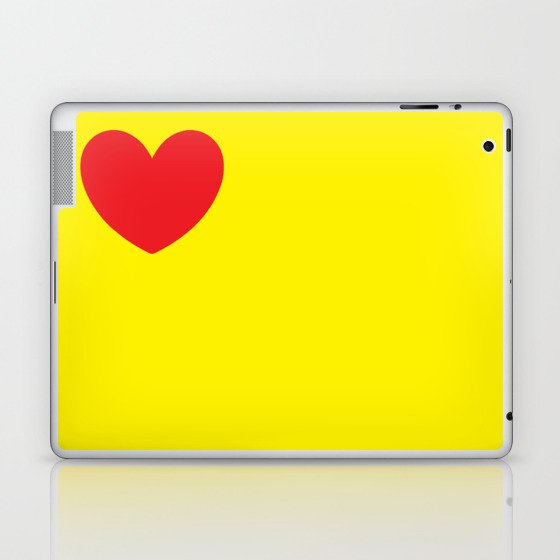 Red heart in yellow Laptop & iPad Skin