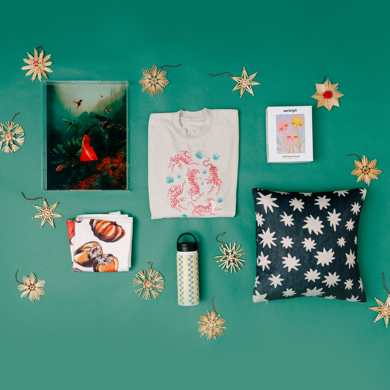 Society6 on Instagram: Take 50% off your favorite unique Wrapping Paper  today on Society6.com! Designs: 🏠 Holiday Town with Pets by  @emilydolinerart ⭐️ Big Starbursts on Green by @emilydolinerart