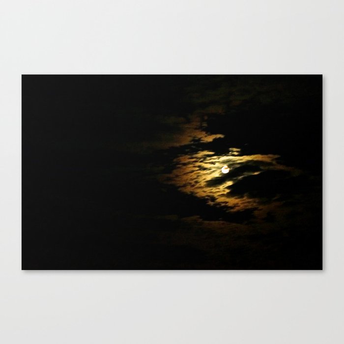 Clouded Moon Canvas Print