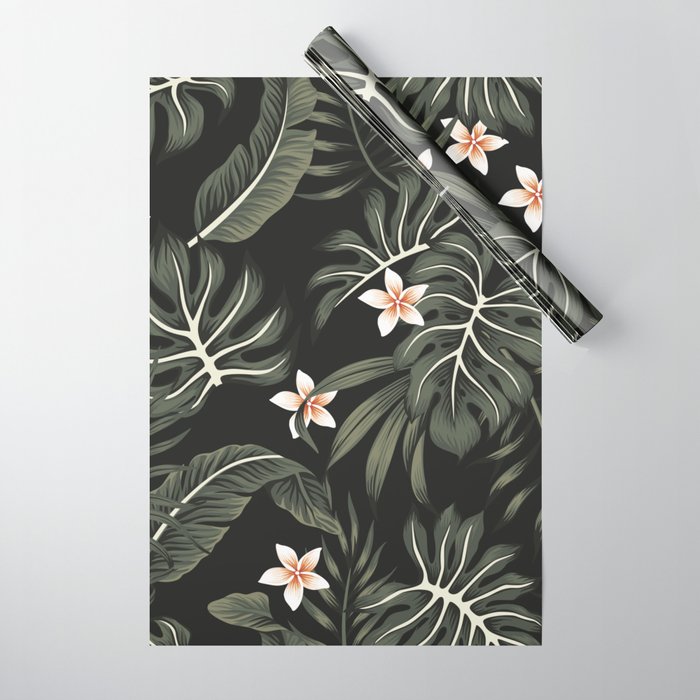 Tropical vintage plumeria flower, strelitzia, palm leaves, monstera leaves  Hawaiian floral seamless pattern black background. Exotic jungle night  wallpaper. Wrapping Paper by Home Magazine