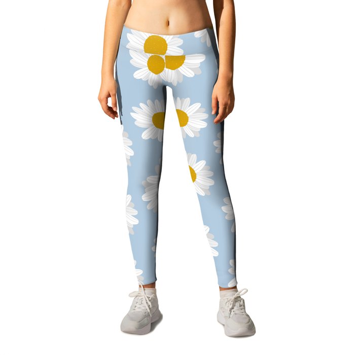 Little White Daisies and Sky Blue Background Leggings