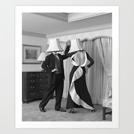 After party party animals; tipsy couple with lampshades on their heads funny humorous black and white vintage photograph - photograph - photographs Art Print