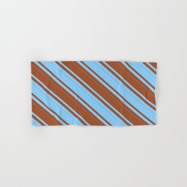 [ Thumbnail: Sienna and Light Sky Blue Colored Lines/Stripes Pattern Hand & Bath Towel ]