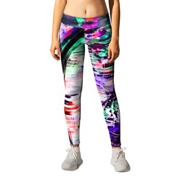 bicycle wheel with colorful abstract background in green red and purple Leggings