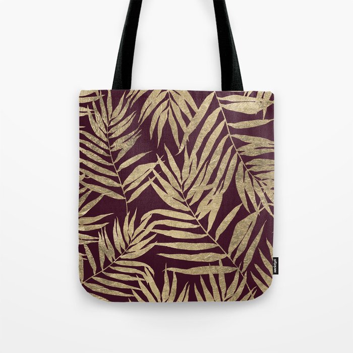 Tropical burgundy gold palm tree leaves foliage Tote Bag