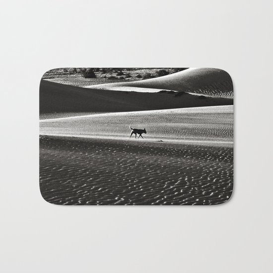 Walking alone through the desert of life Bath Mat