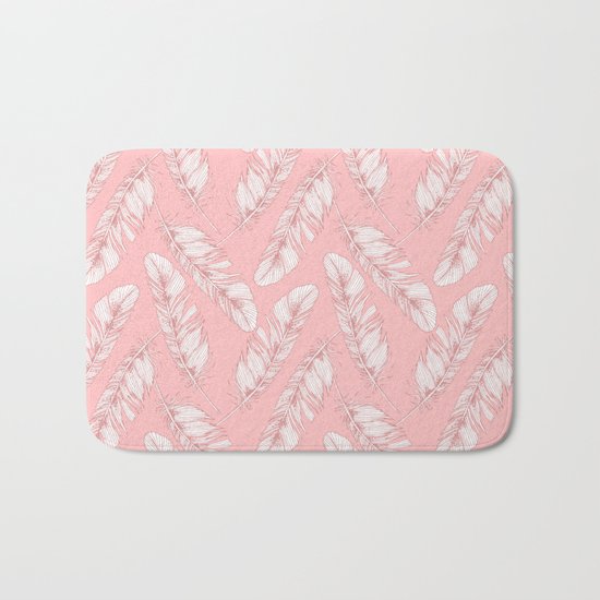 White feathers on a pink background Bath Mat