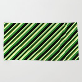 [ Thumbnail: Green, Light Yellow, Forest Green & Black Colored Stripes Pattern Beach Towel ]