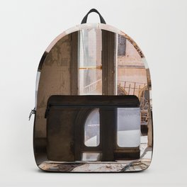 Window in Abandoned Building with Sunlight Backpack