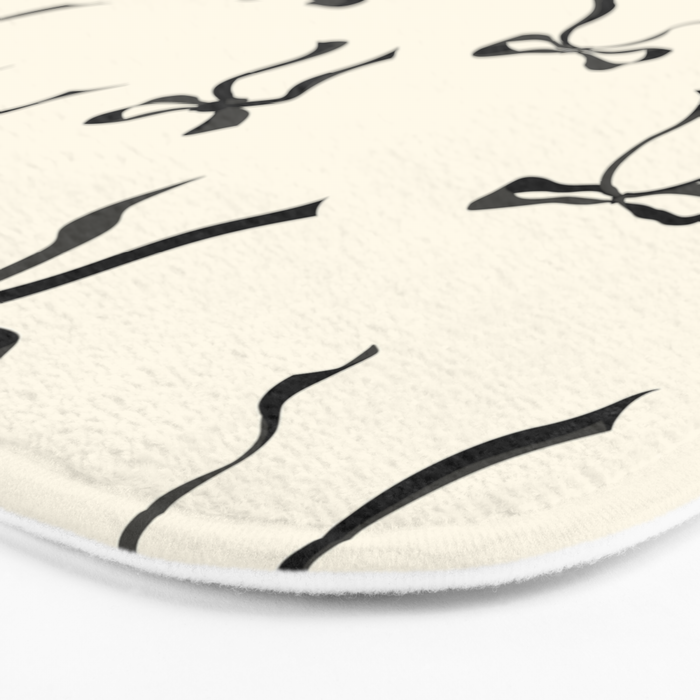 Coquette black loose ribbons on a cream background pattern