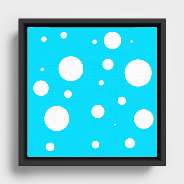 White polka dots on blue background Framed Canvas