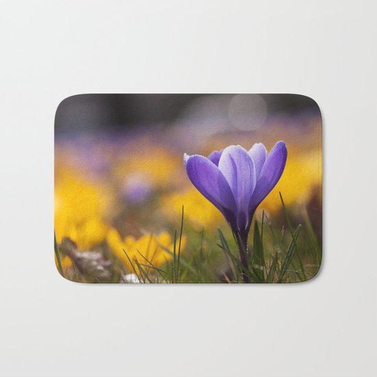 Crocus in a meadow Bath Mat