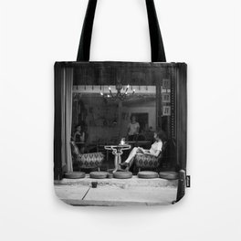 Morning coffee in a cafe - Black and white street photography Tote Bag