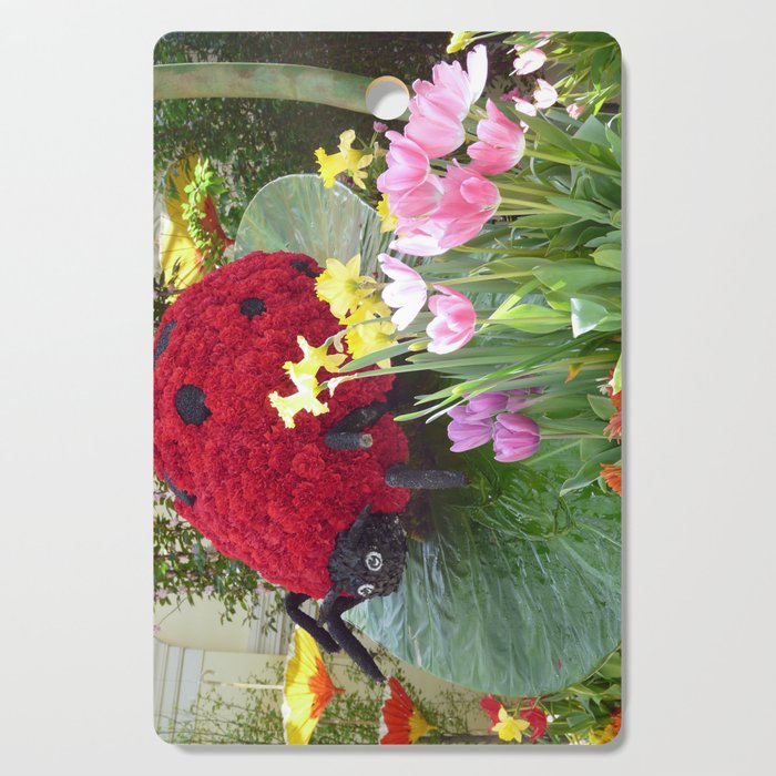 Lady bug made of flowers Cutting Board