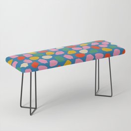 Ink Dot Mosaic Pattern in Rainbow Pop Colors on Bright Blue Bench