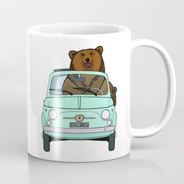 A smiling bear driving a small light blue car Coffee Mug