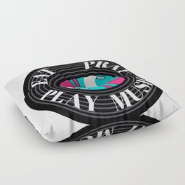The circular colored illustration shows a black vinyl on which the words eat, pray, play music Floor Pillow