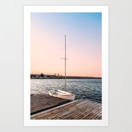 Mediterranean sunset over a wooden jetty with sailing boat Art Print