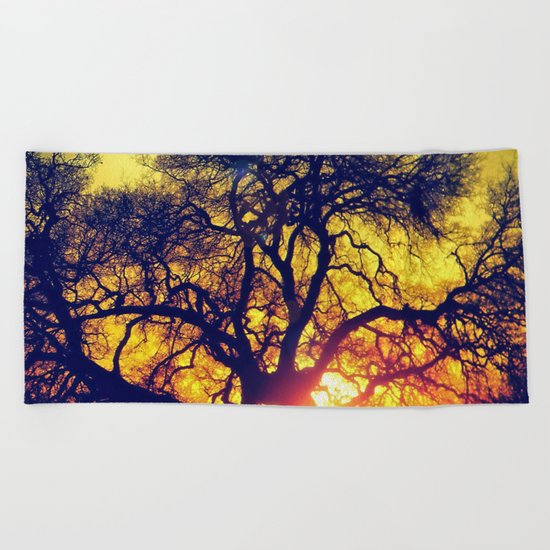 Through the trees Beach Towel