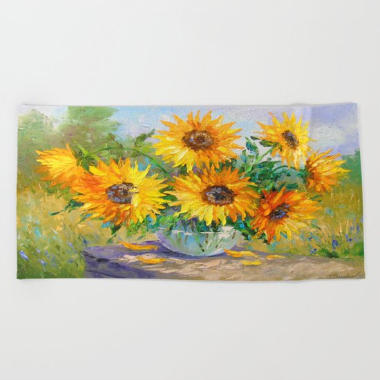 Bouquet of sunflowers on the table Beach Towel