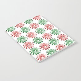 Peppermint swirl candies on white Notebook