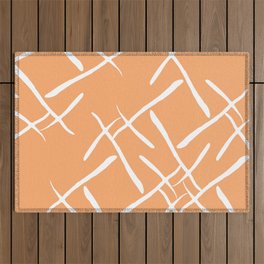 White cross marks on salmon background Outdoor Rug
