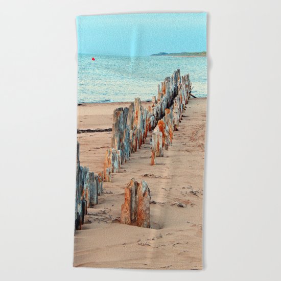 Wharf Remains on the Beach Beach Towel