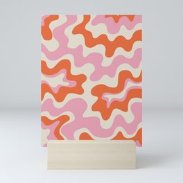 Pink and orange retro style liquid swirls Mini Art Print