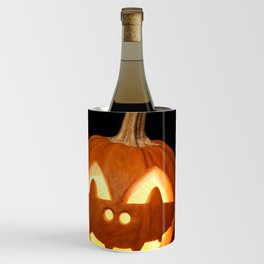 Carved Pumpkin for Halloween and Autumn Leaves on Black Background Wine Chiller