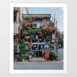 Urban Architecture with Lush Plants and Flowers on a Cozy Corner Storefront – Urban Photography Art Print
