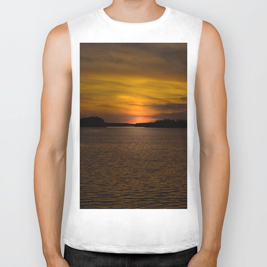 The sun goes down and night falls Biker Tank