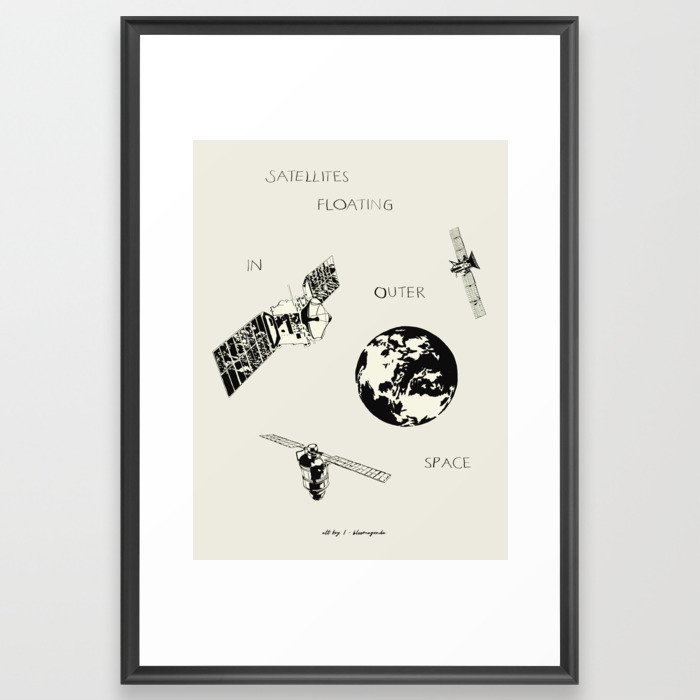satellites floating in outer space Framed Art Print