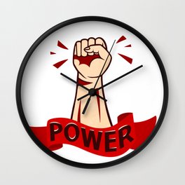 Raised in protest male hand in the air with red ribbon and lettering power Wall Clock