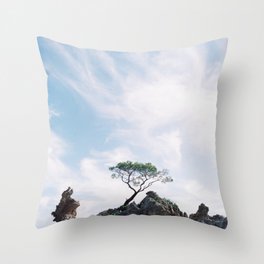 Tree on the rock Throw Pillow