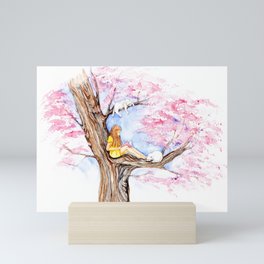 Reading Book under Sakura Tree Mini Art Print