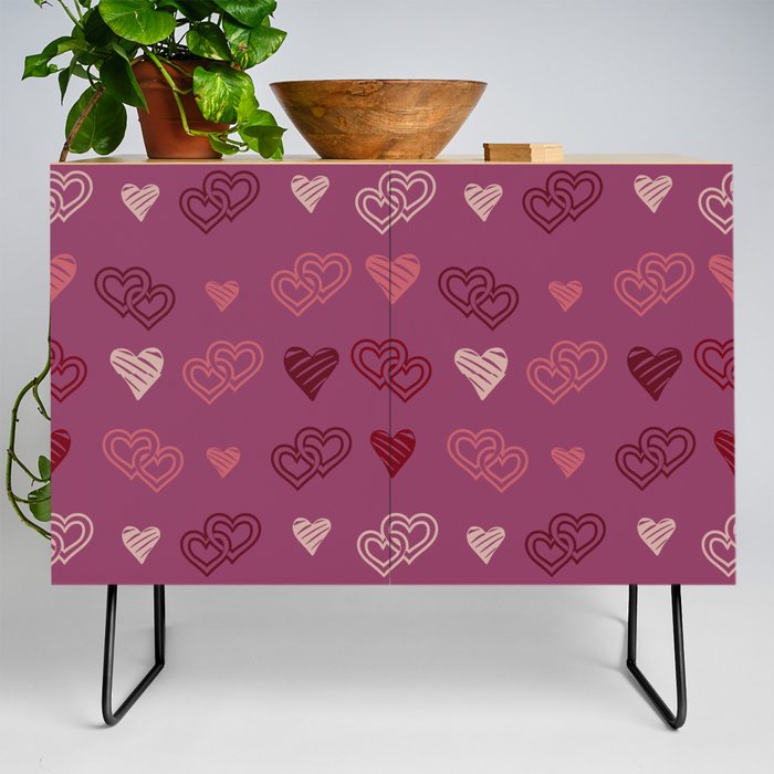 Hearts on a burgundy background. For Valentine's Day. Vector drawing for February 14th. SEAMLESS PATTERN WITH HEARTS. Anniversary drawing. For wallpaper, background, postcards. Credenza