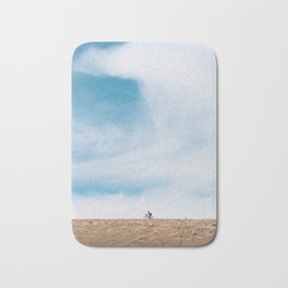 Rides under a big sky Bath Mat