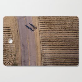 Campagne biking on the road Cutting Board