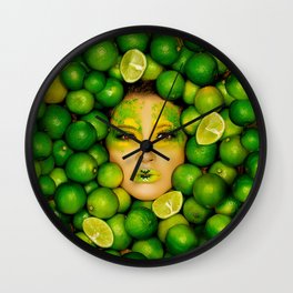 Fun face of a woman surrounded by green citrus limes color art photograph - photography  Wall Clock