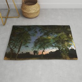 Sunset in the wood Rug