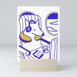 Dog on a plane Mini Art Print