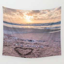 Love note Te Amo with the heart drawing on the beach at sunrise Wall Tapestry