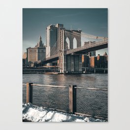 New York City Manhattan skyline and Brooklyn Bridge during winter Canvas Print