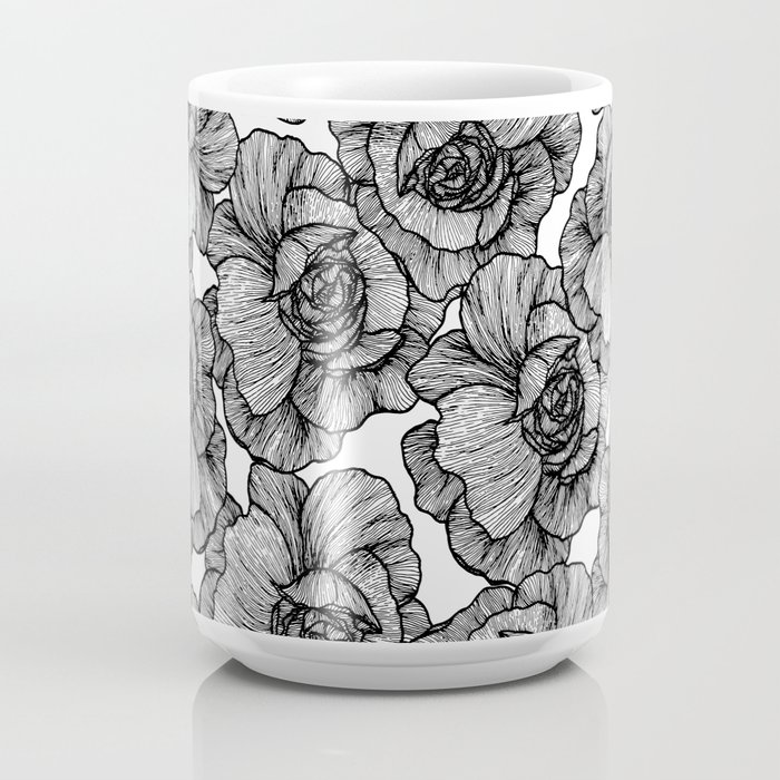 https://ctl.s6img.com/society6/img/vLtOHKIh3SoR6CSbxOHP2o-TcCc/w_700/coffee-mugs/large/front/greybg/~artwork,fw_4600,fh_2000,iw_4600,ih_2000/s6-0092/a/35728291_3568646/~~/elegant-black-and-white-modern-line-art-flowers-gvm-mugs.jpg