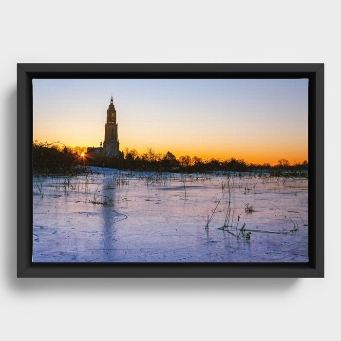 Early morning sunrise on the ice Framed Canvas